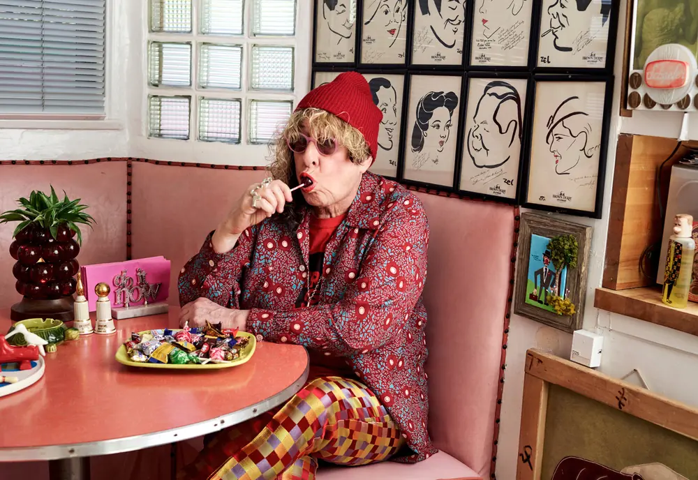 Colorful editorial portrait at a dining table