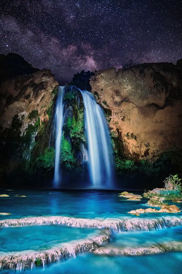 Havasu Falls illuminated beneath the Milky Way during a two-in-the-morning exposure