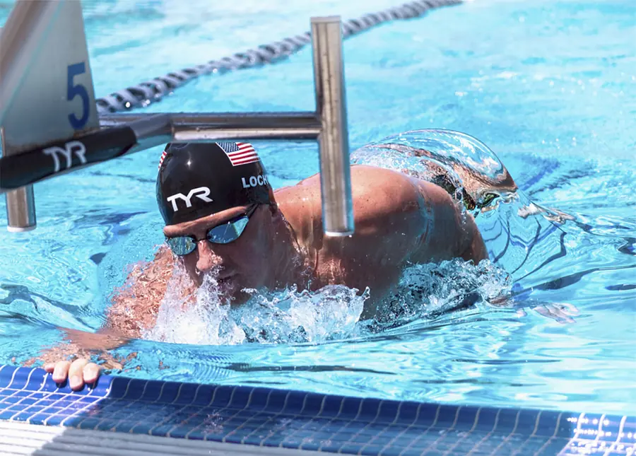 Ryan Lochte swimmer surfacing at the lane wall